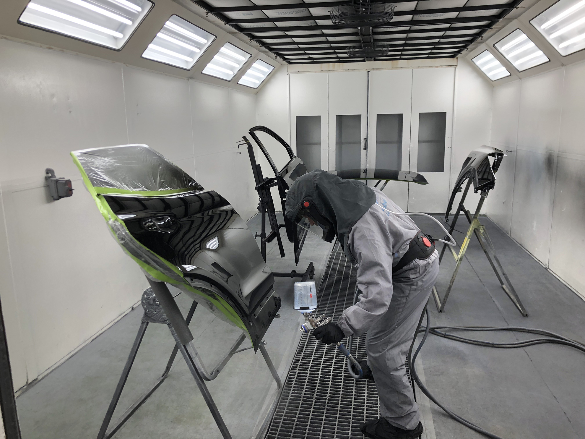 Car parts in spray booth