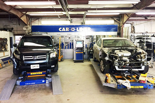 Two cars on fame machines